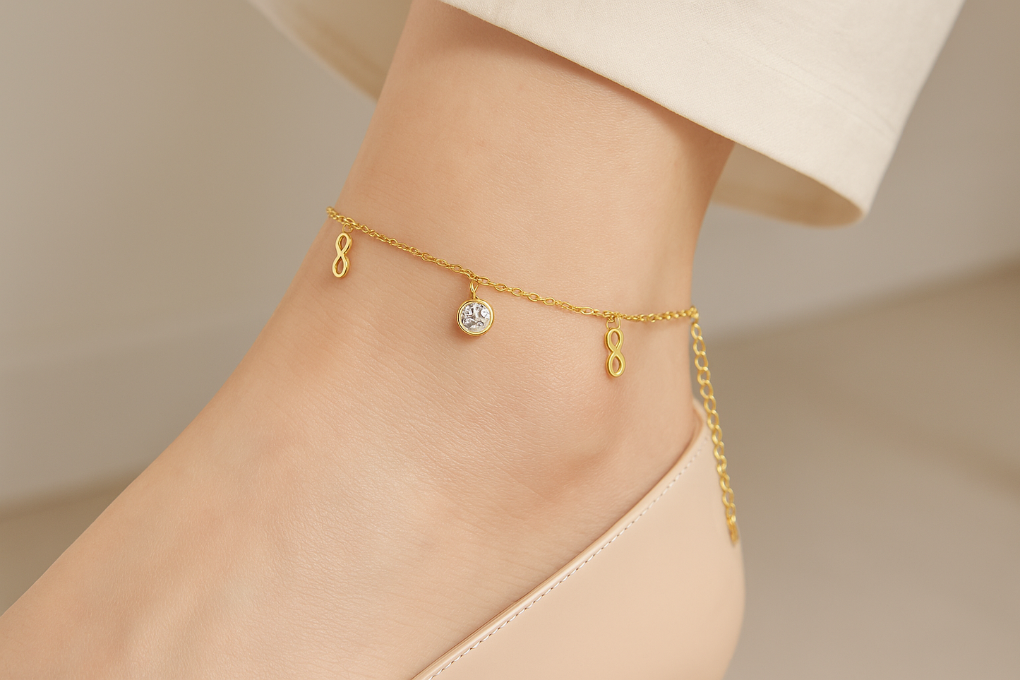 Professional lifestyle photography of a white female model wearing the infinity anklet