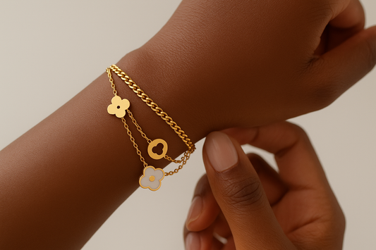 Professional lifestyle photography of an African American female model wearing the gold flower charm bracelet